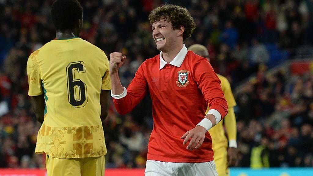 Lewis Koumas celebrates scoring against Ghana
