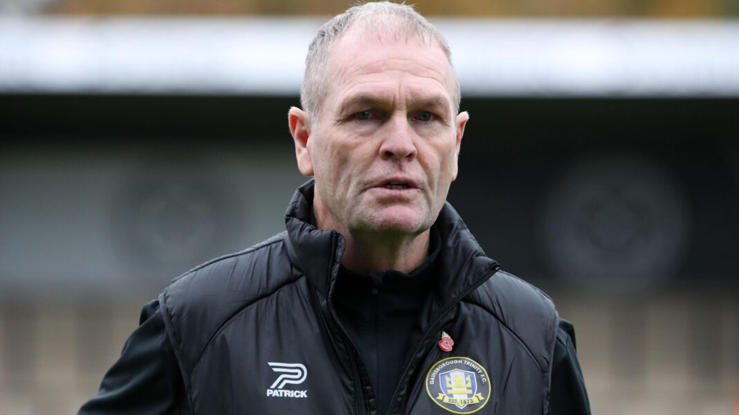 ‘Get a life’ – non-league club condemn man impersonating manager Russ Wilcox wearing a black jacket with a Gainsborough Trinity badge on the chest