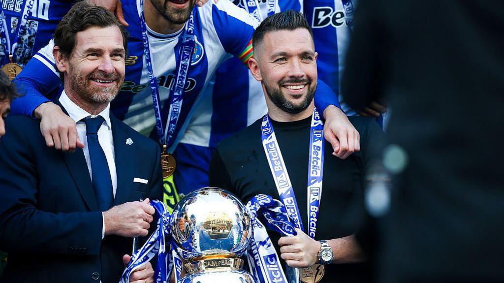 Francesco Farioli holding the Portuguese title with Porto president Andre Villas-Boas