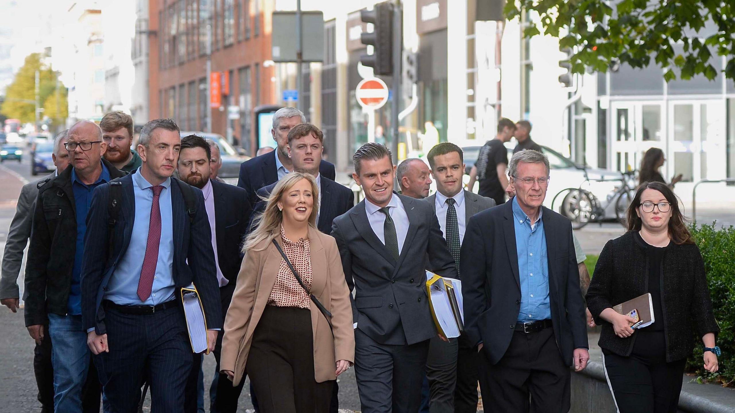 The Garvaghy Road Residents' Coalition and their legal team arrive at Belfast High Court