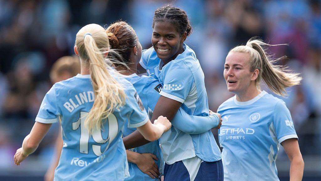 Manchester City celebrate victory over Birmingham City