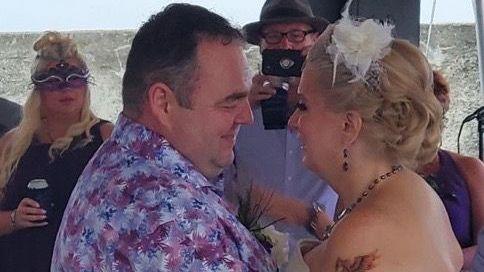 Damien Given and his wife, Kellie, dance at their wedding in New Jersey in 2020