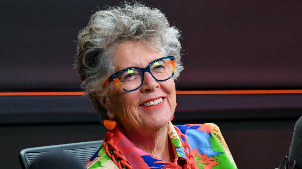 Prue Leith wearing a colourful shirt and glasses on the BBC Radio 2 Breakfast Show on Friday 20 February 2026.