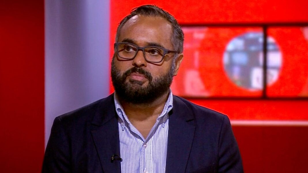Why Trump is all-in on AI despite the warnings Marc Cieslak is pictured in the BBC newsroom. He is wearing glasses, a navy jacket and a blue striped shirt