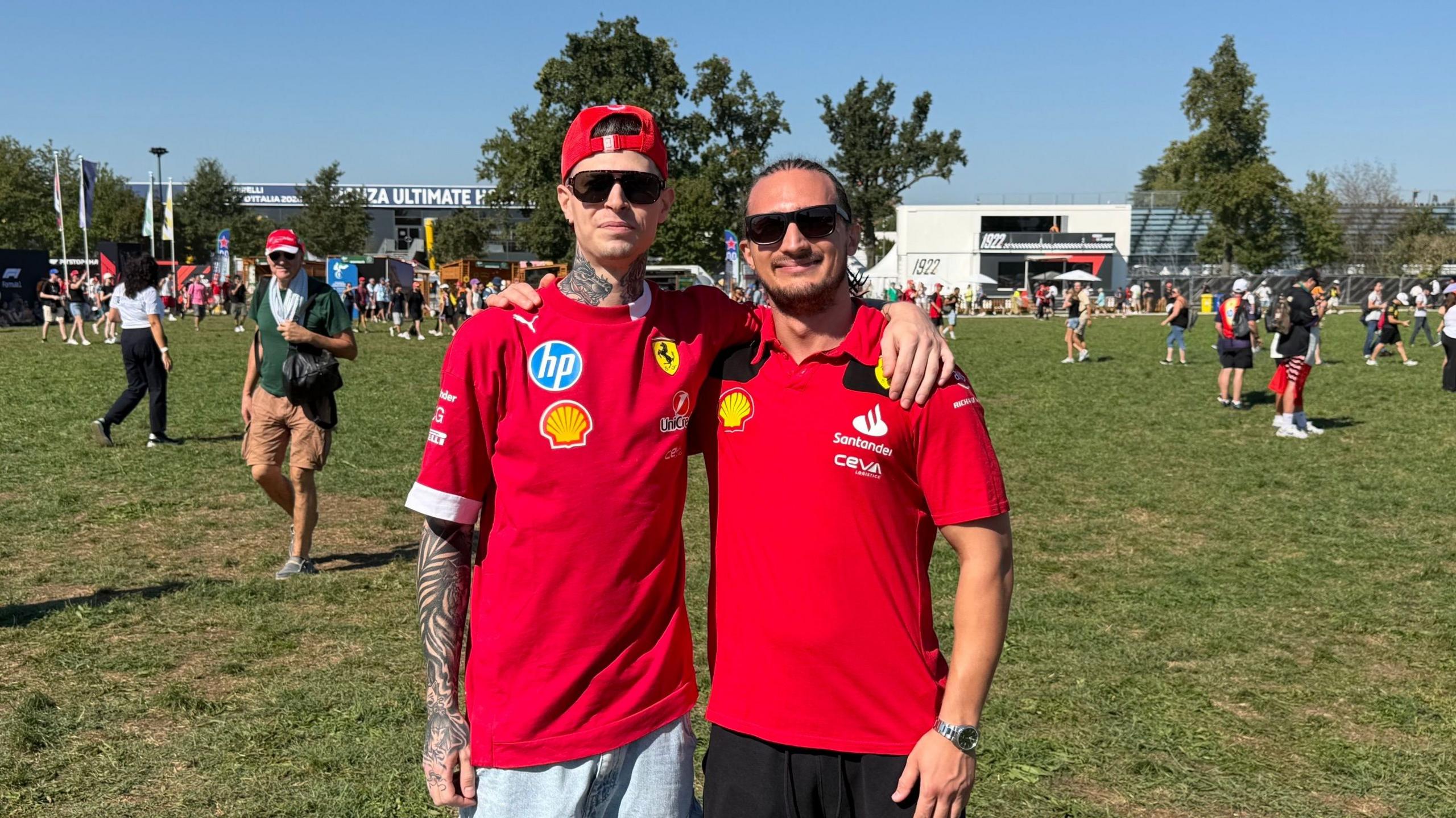 Axl and Thomas pose for photos in the fanzone in Monza