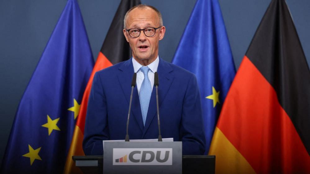German Chancellor Friedrich Merz gives a statement after first exit polls of the Berlin and Mecklenburg Western Pomerania state elections, at the CDU headquarters in Berlin