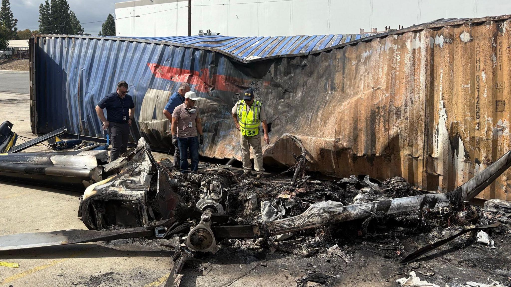 The National Transportation Safety Board released photos of the aftermath of the Los Angeles helicopter crash that killed three people.