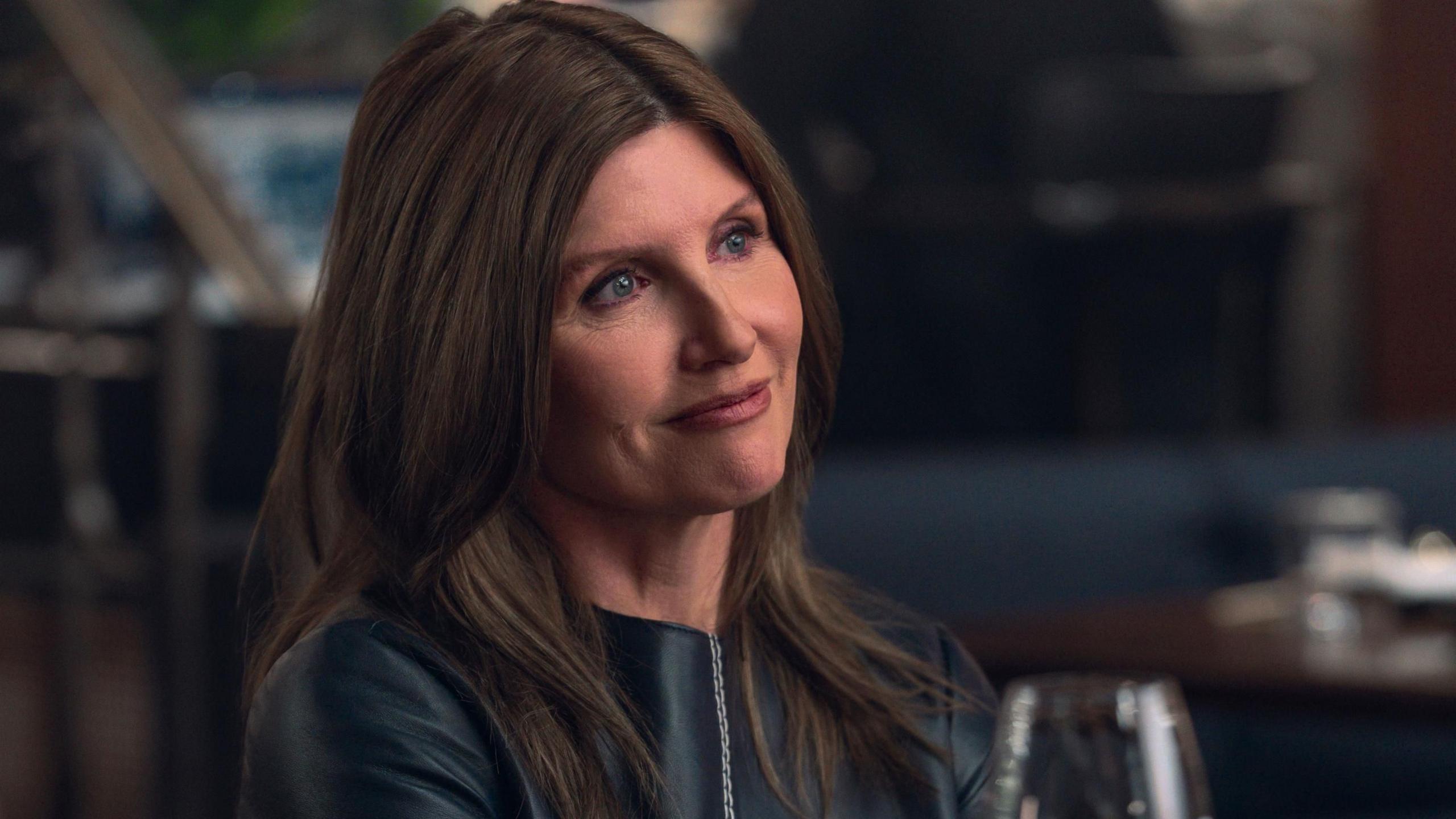 Sharon Horgan in Youth, she is wearing a black top and has her brown hair down