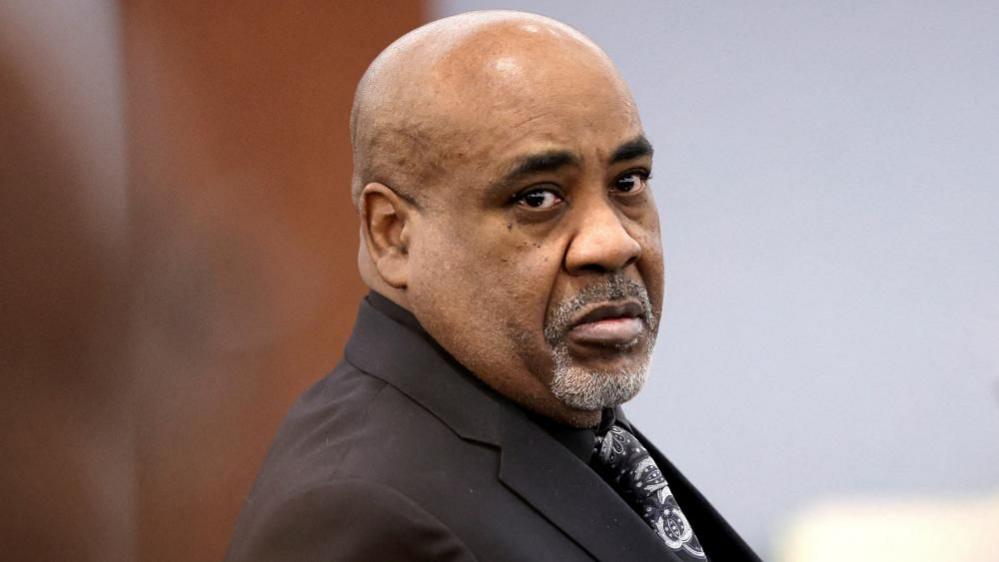 Duane Davis stands during a break in closing arguments in his murder trial,