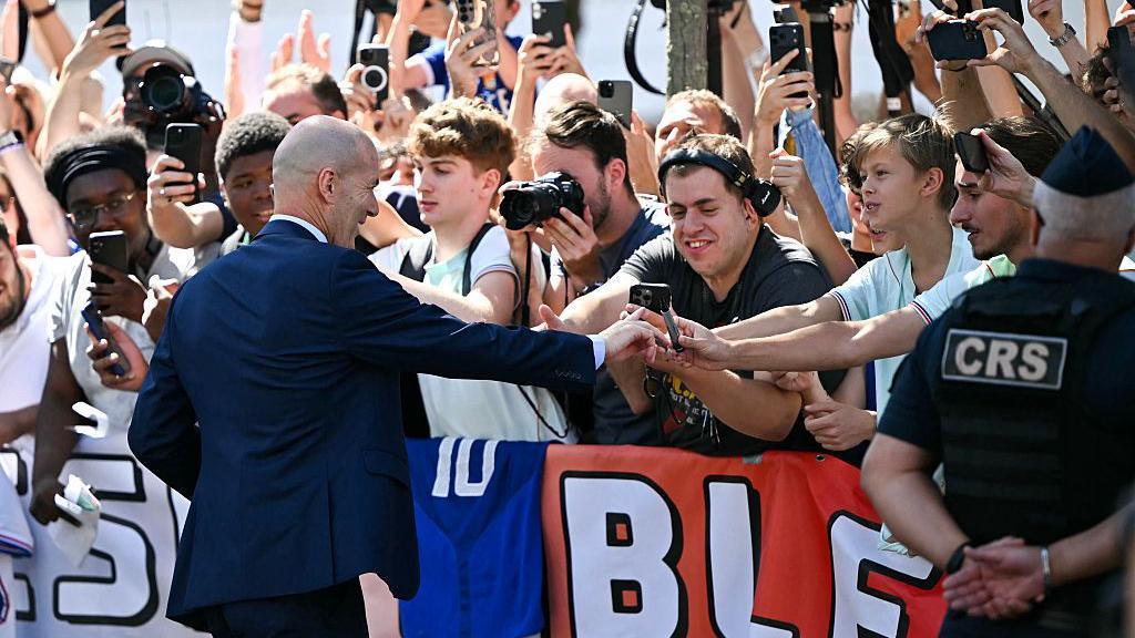 Zinedine Zidane greets fans