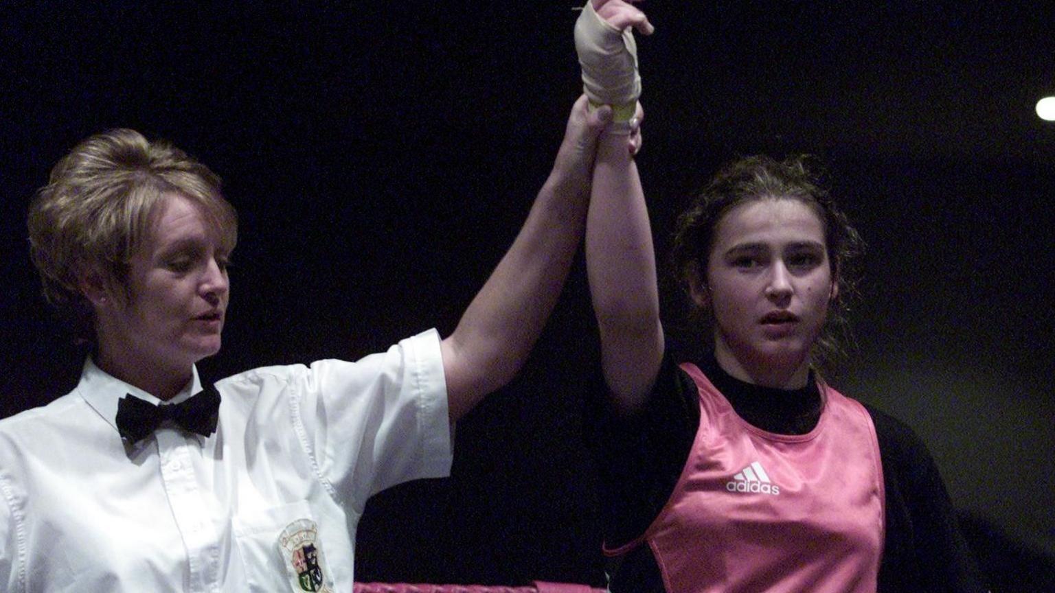 Katie Taylor with hand raised in 2001