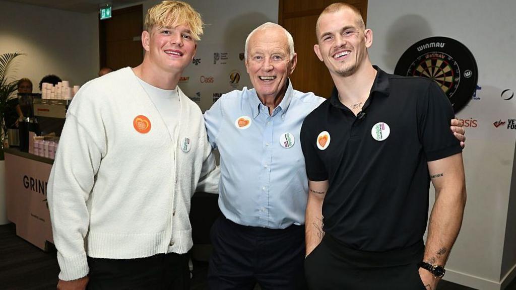Pollock poses with Barry Hearn and Ian Machado Garry