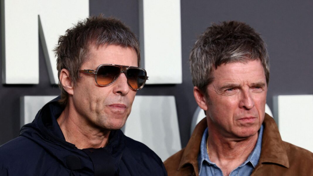 Oasis take legal action to stop sale of unheard tapes Liam (left) and Noel Gallagher stand side by side. Liam is wearing sunglasses and a dark jacket. Noel is wearing a light blue shirt and brown jacket.