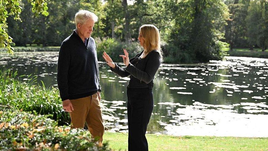 Earl Spencer with Laura Kuennsberg at his Althorp estate, with a lake visible in the background