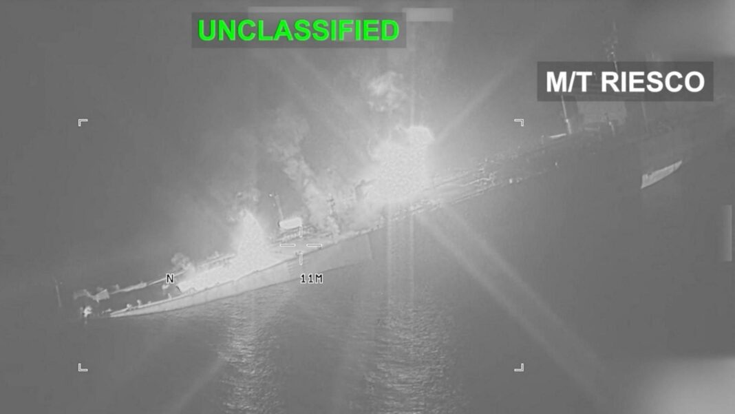 Oil hits $100 a barrel for first time since July after US and Houthi strikes An Iranian crude oil carrier identified as M/T Riesco is seen ablaze and sinking in the Gulf Oman following a US attack, in a video released by Centcom (8 September 2026)