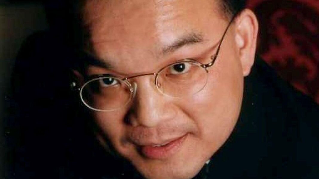 UK survivor of Canadian poison seller says he exploited her despair Close up image of Kenneth Law's face. He is looking at the camera and is wearing glasses.