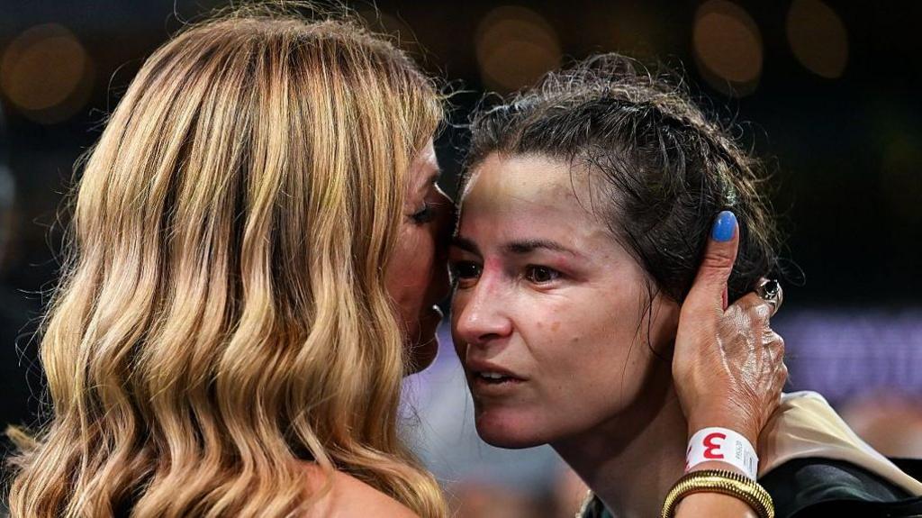 Katie Taylor is embraced by her mother Bridget