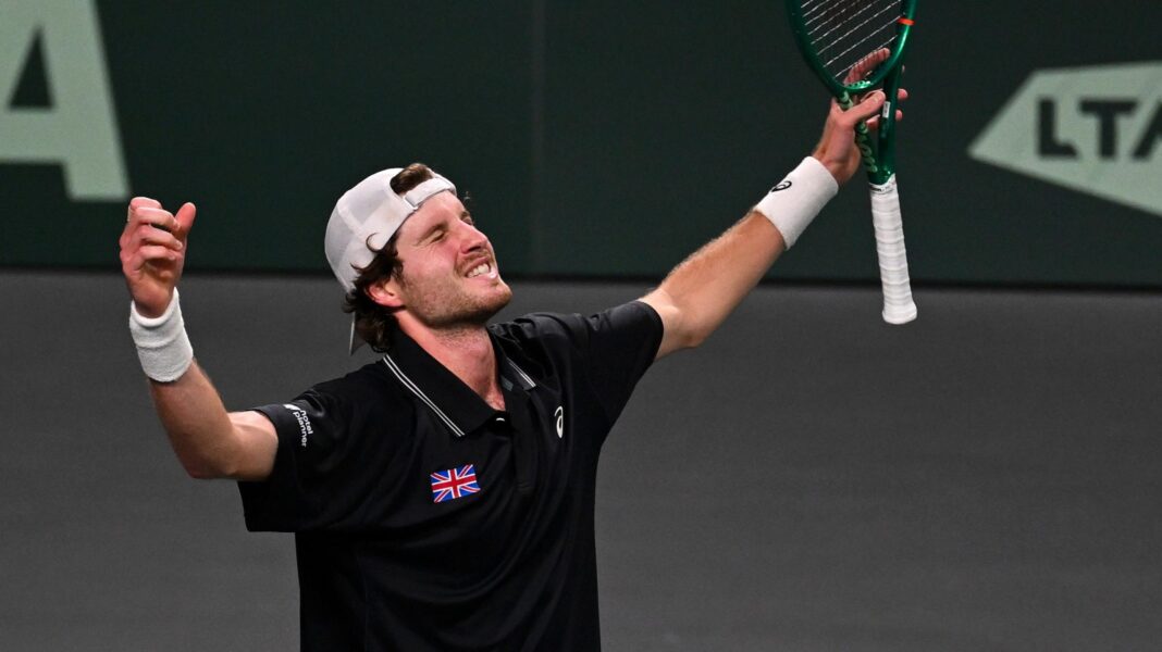 Toby Samuel celebrates winning Davis Cup match