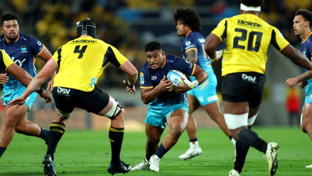 Samiuela Moli tries to make a break for Moana Pasifika during a Super Rugby game against Hurricanes in 2024