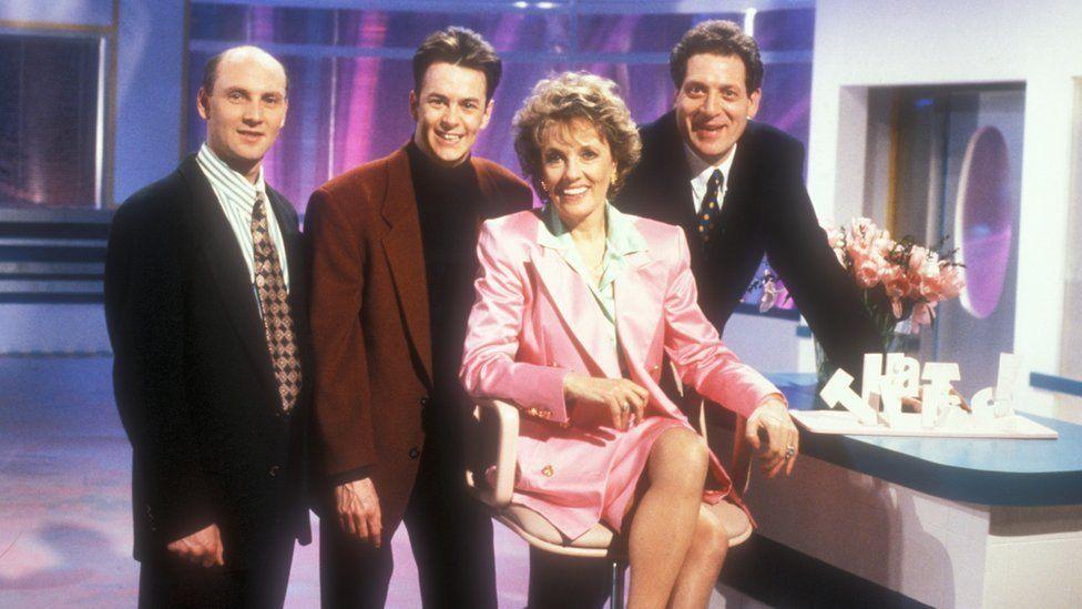Dame Esther with fellow That's Life! presenters Howard Leader, Kevin Devine, and Gavin Campbell in 1993