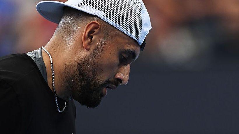 Nick Kyrgios looks down during a match