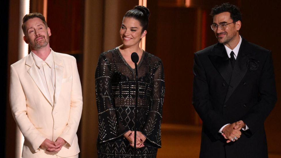 US actor Macaulay Culkin, Canadian actors Annie Murphy and Dan Levy speak onstage during an homage to late actress Catherine O'Hara the 78th Primetime Emmy Awards at the Peacock Theatre at LA Live in Los Angeles on September 14, 2026.
