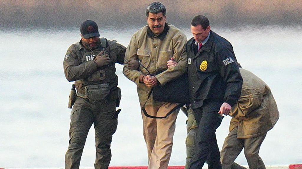 Nicolas Maduro is seen in handcuffs after landing at a Manhattan helipad, escorted by heavily armed Federal agents as they make their way into an armored car en route to a Federal courthouse in Manhattan on 5 January 2026 in New York City.