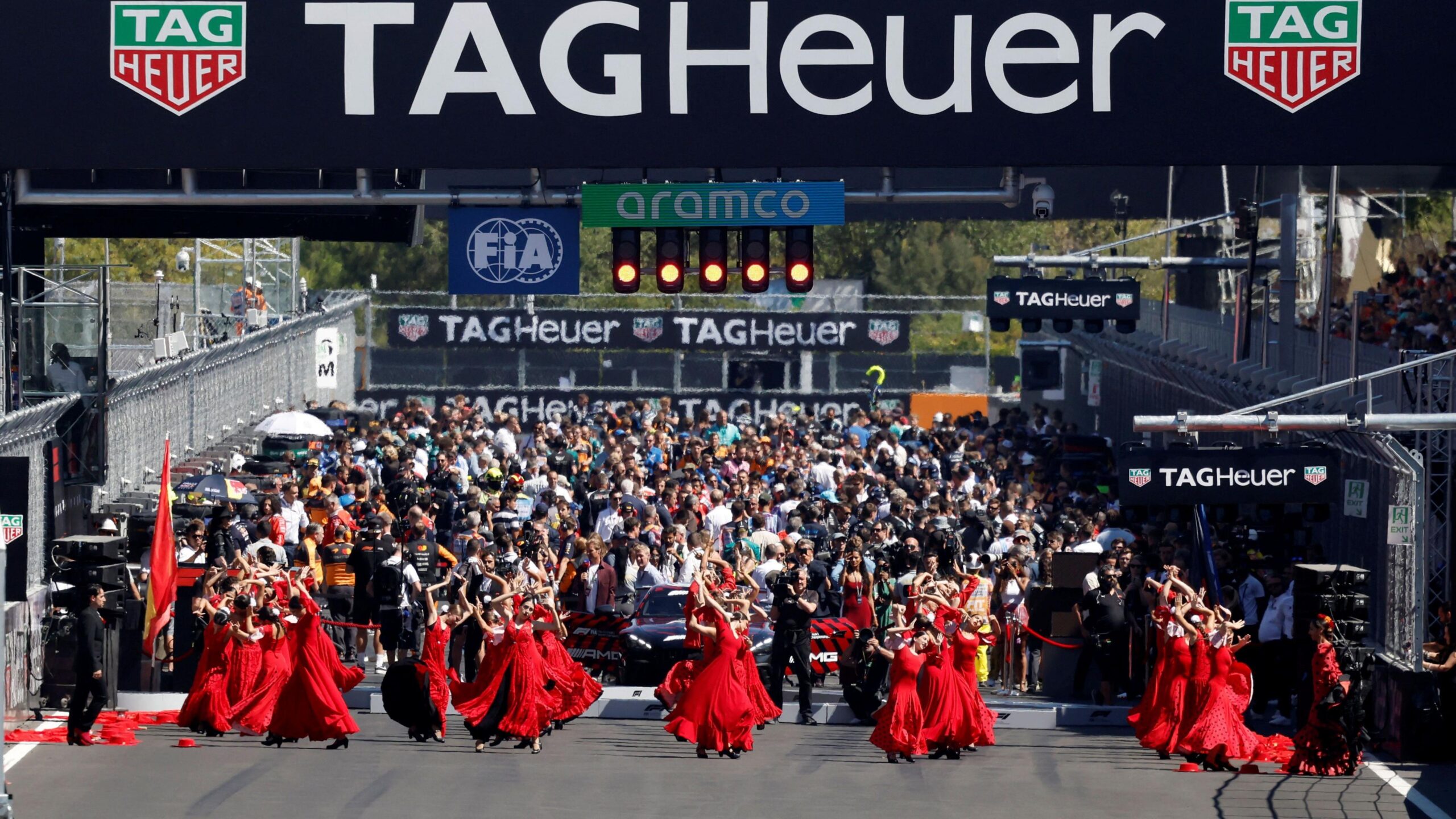 dancers perform on the track before the race in Madrid