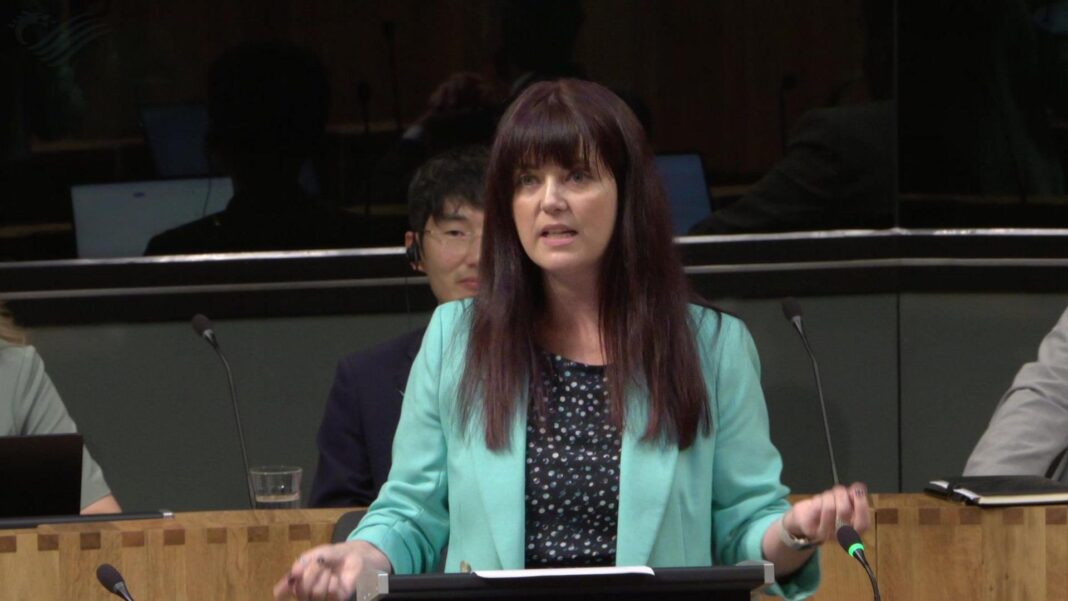 An arrest, a defection and a new leader – how Reform’s ‘challenging’ week unfolded Helen Jenner at First Minister's Questions in the Senedd chamber. She is standing behind a lectern and has long dark hair with a fringe. She is wearing a light turquoise blazer, a dark top with a white speckled or polka-dot pattern. Papers or notes are placed on the lectern. Three other Senedd members are partially visible.
