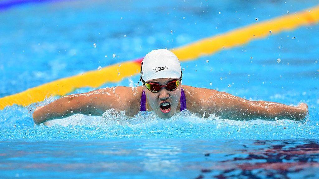 Yu Zidi of China competes in the Women's 200m butterfly final on day one of the 20th Asian Games