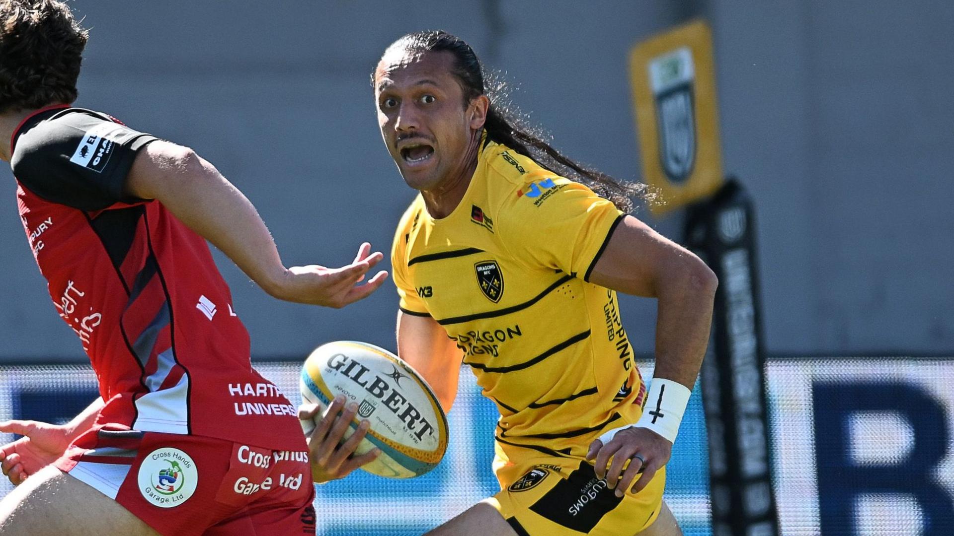 Ereatara Enari runs with the ball for Dragons against Hartpury