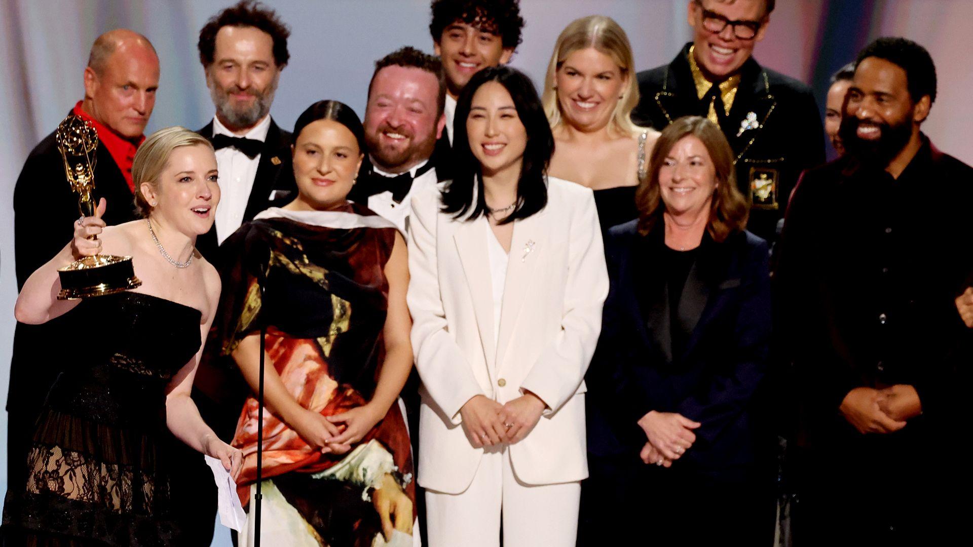 Cast and crew including Colton Dunn, presenter Woody Harrelson, Katie Dippold, Matthew Rhys, Carver Karaszewski, Neil Casey, Kingston Rumi Southwick, Jeff Hiller and Kevin Carroll, accept the Outstanding Comedy Series Award for "Widow's Bay" on stage during the 78th Primetime Emmy Awards held at the Peacock Theater on September 14, 2026.