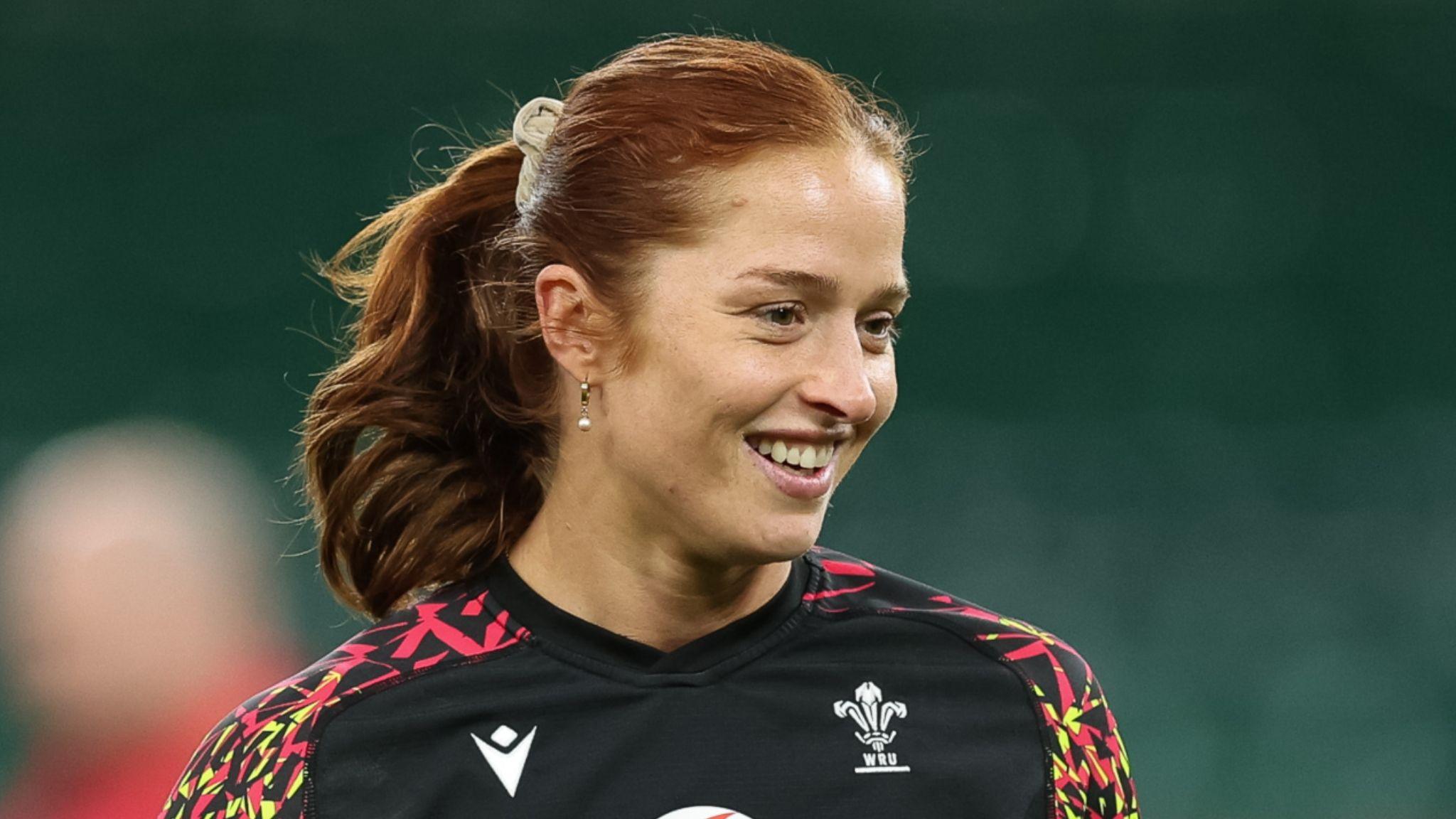 Lisa Neumann smiles during training
