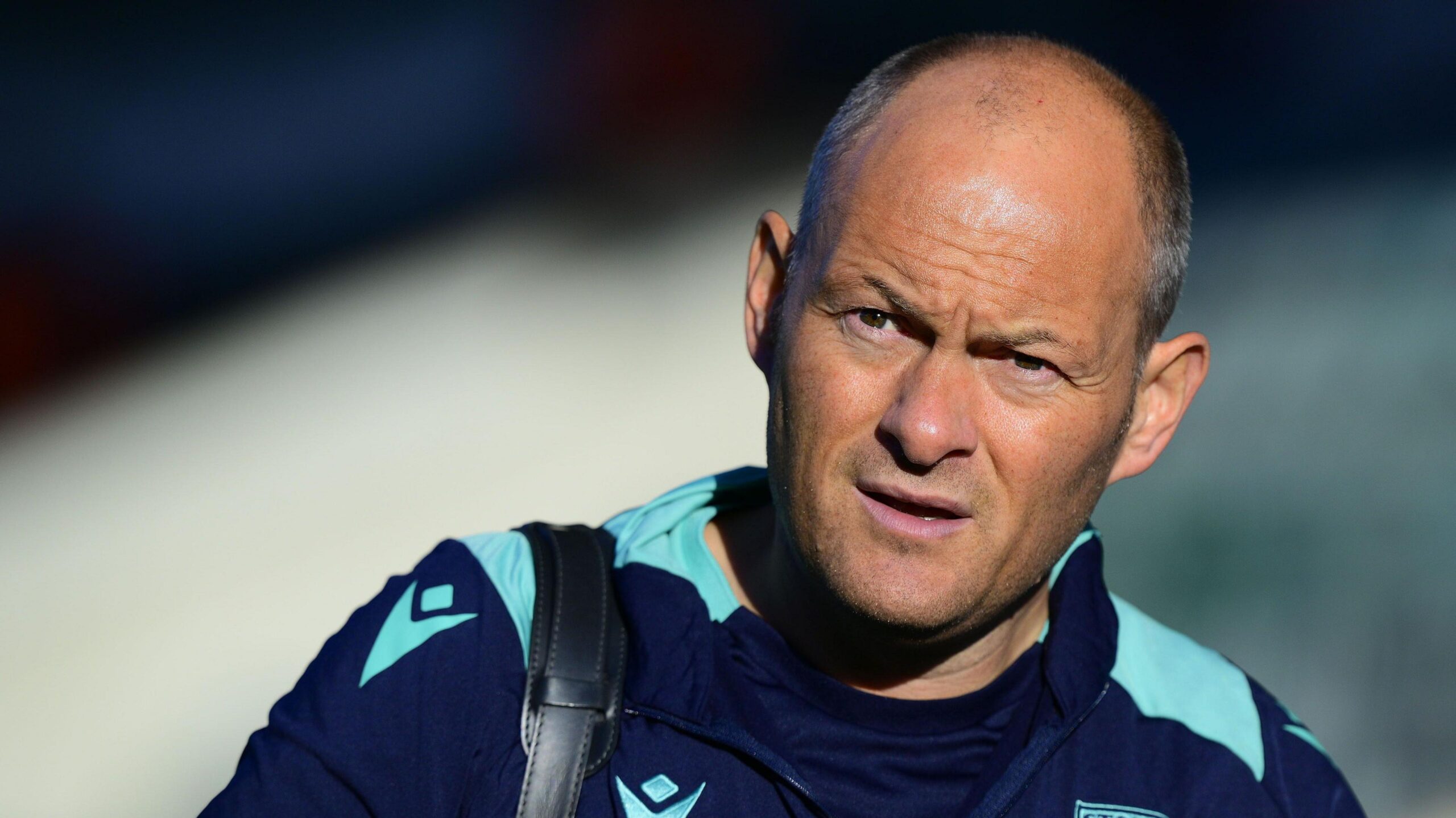 Alex Neil looks on