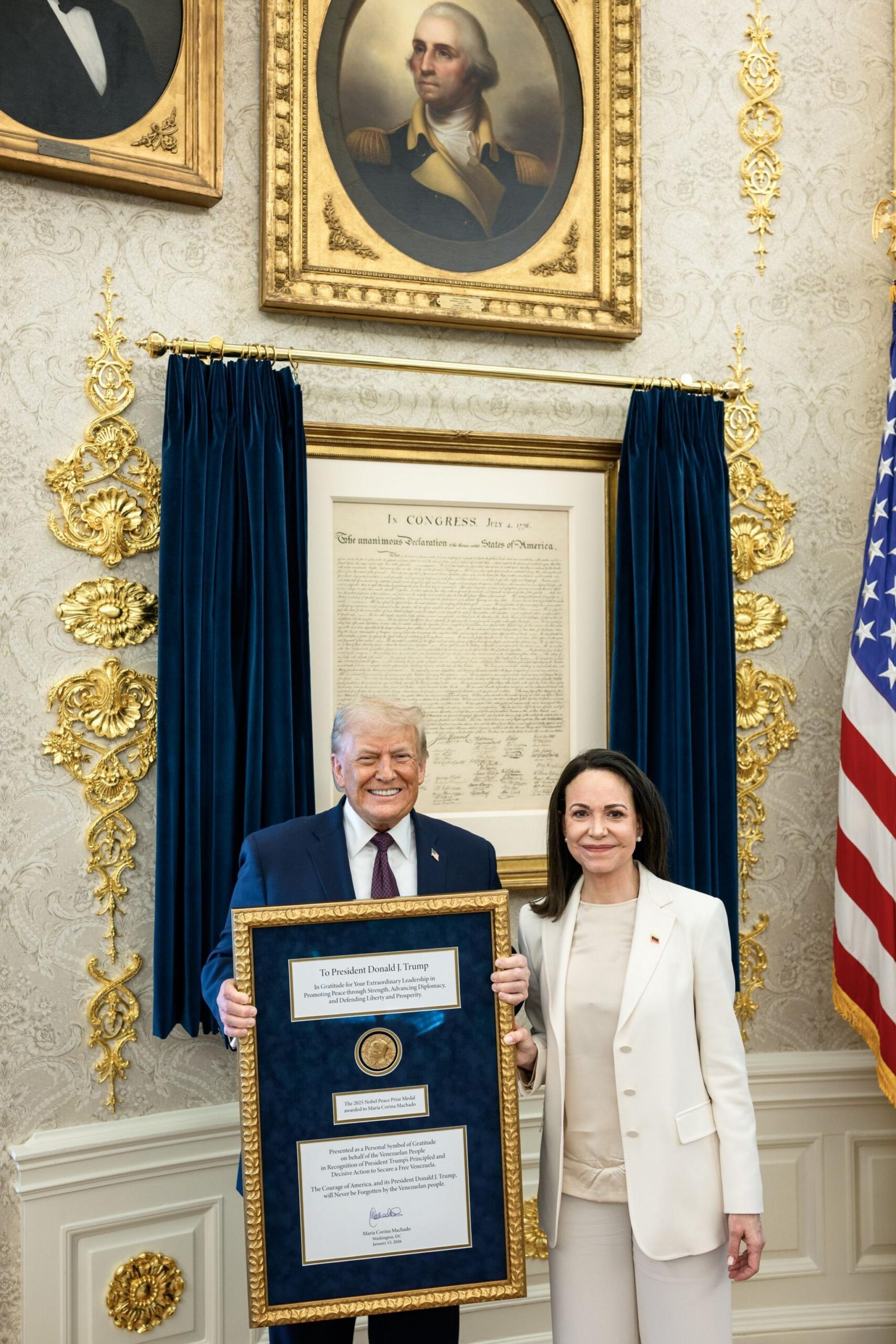 María Corina Machado and President Trump hold the Nobel in the White House