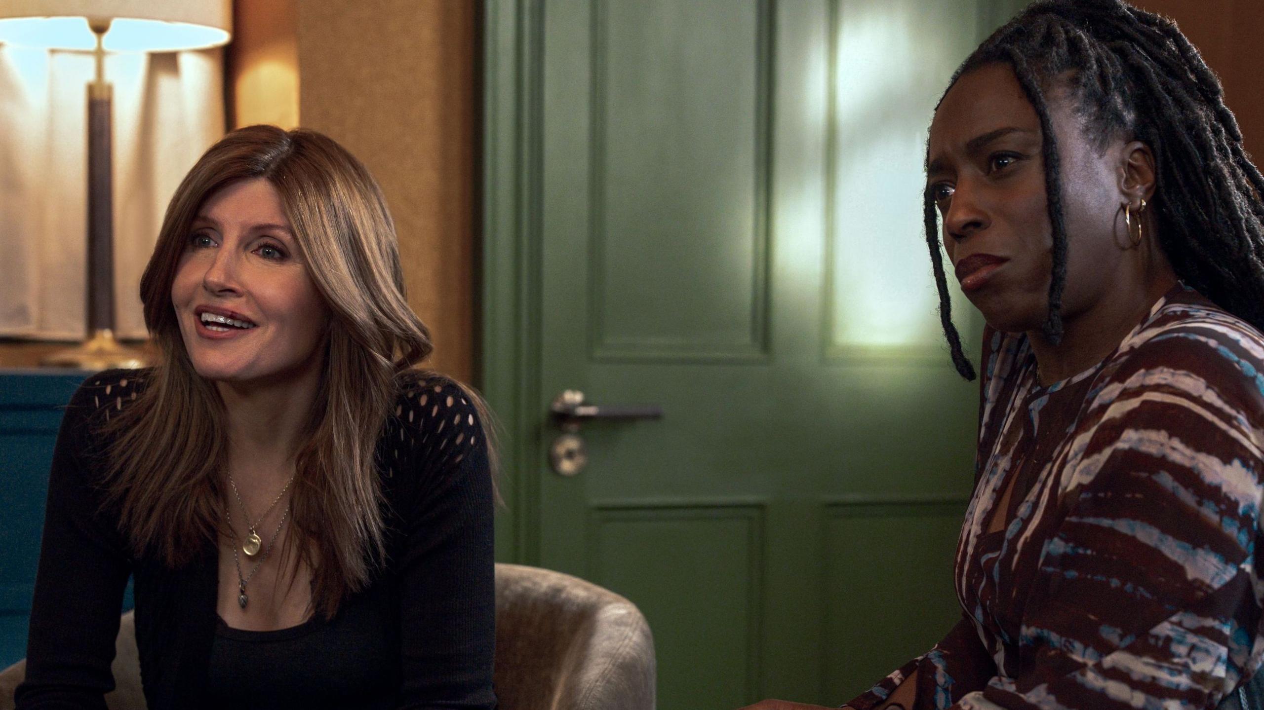 Sharon Horgan as Alex and Sharlene Whyte as Sam in Youth. They are sitting on armchairs chatting to someone sitting opposite them who we can't see in the shot.