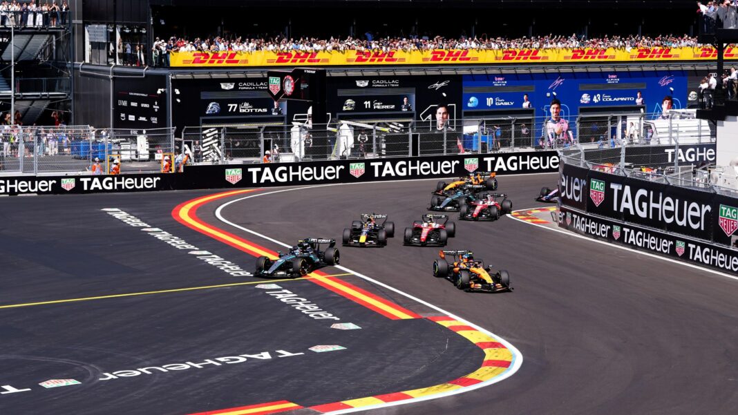 Kimi Antonelli runs wide as Lando Norris leads at Turn One of the opening lap at the Spanish Grand Prix in Madrid