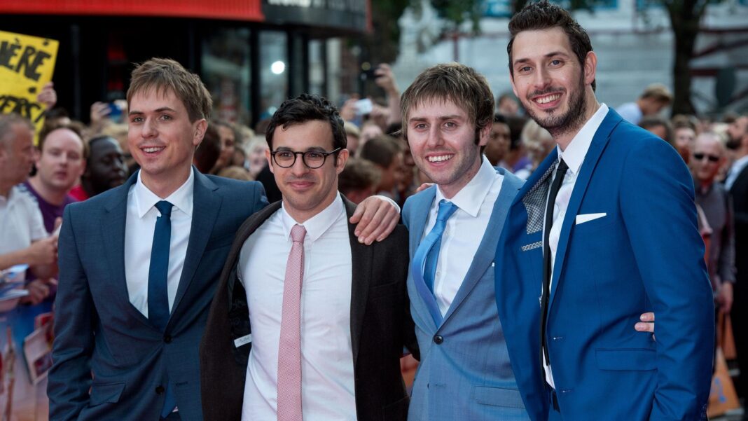 New Inbetweeners film confirmed by Netflix as lead stars return Simon Bird, Joe Thomas, James Buckley and Blake Harrison pose for photos at the world premiere of The Inbetweeners 2. The group are all wearing suits with skinny ties.
