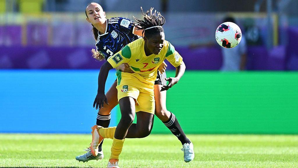 Romaine Gandonou competes with an opponent