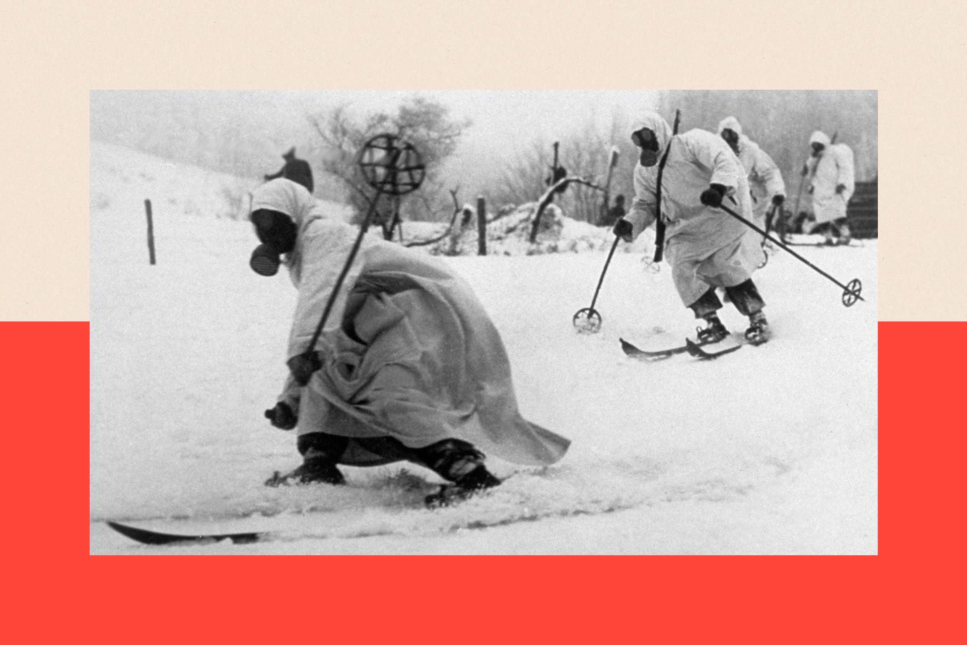 Finnish troops wearing gas masks and white robes skiing across the countryside