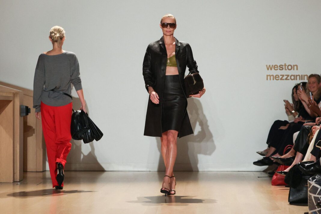Model Jodie Kidd presents a creation by M&S at the brand's SS27 catwalk show at London Fashion Week, in London, Britain, September 18, 2026.