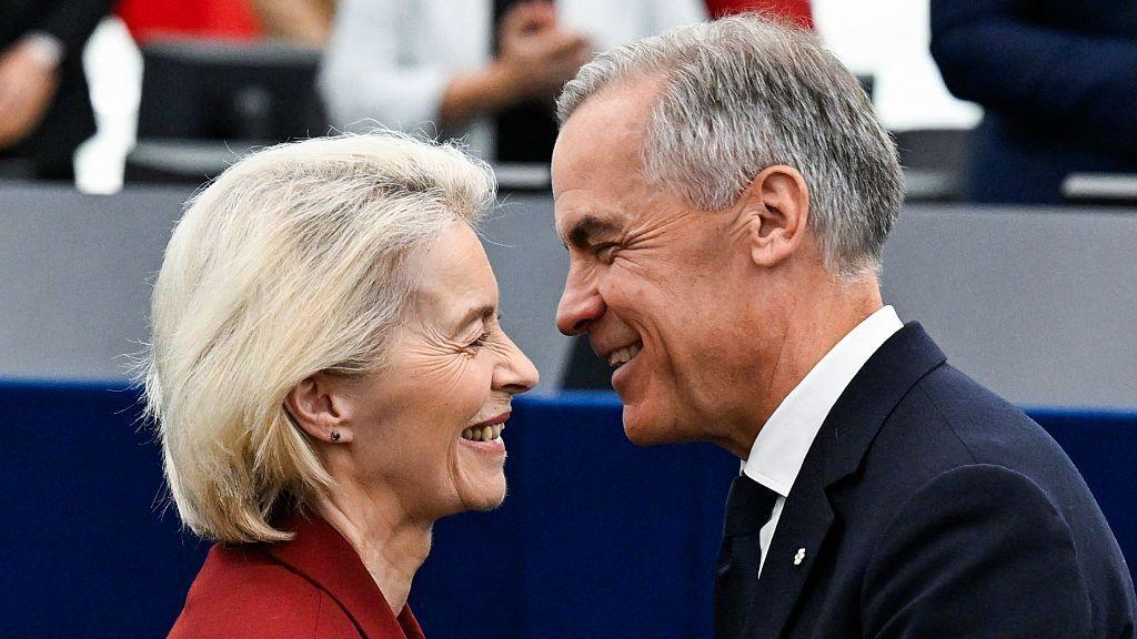 Canada's Prime Minister Mark Carney greets European Commission President Ursula von der Leyen after delivering a speech in the hemicycle at the European Parliament in Strasbourg, eastern France, on September 17, 2026