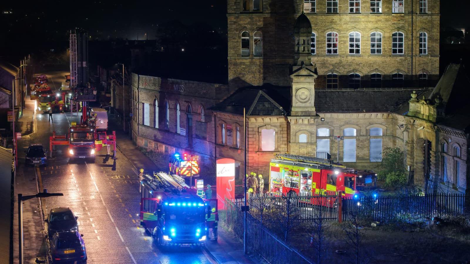 Six fire engines outside a derelict mill in West Yorkshire