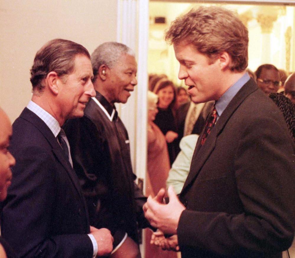 Charles and Earl Spencer speaking at a banquet held in Cape Town in 1997