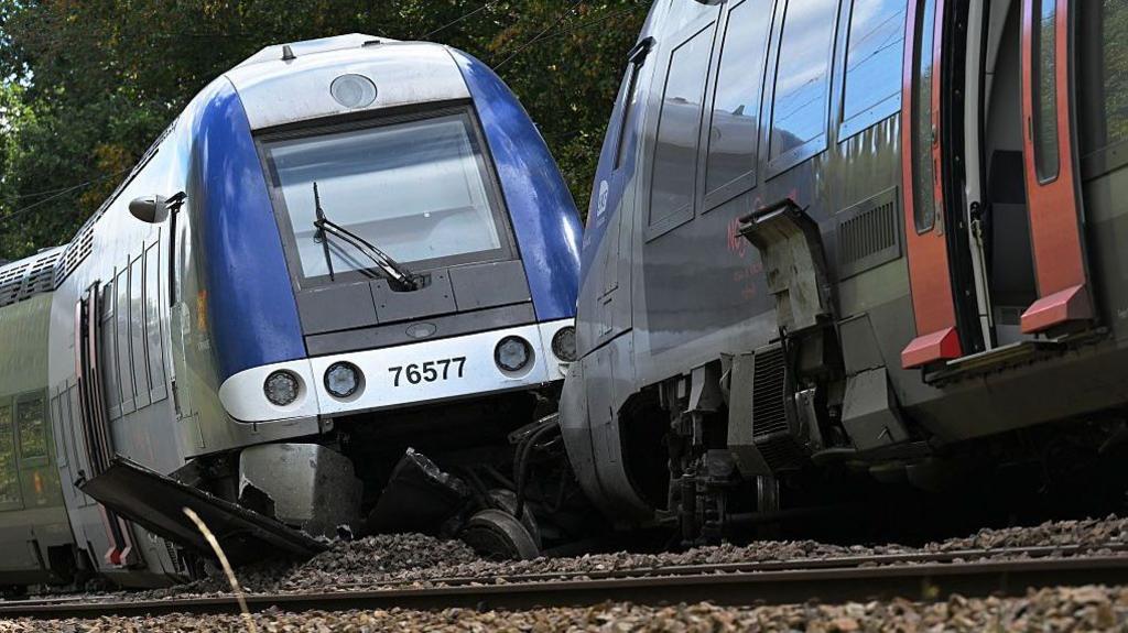 A derailed carriage of a passenger train in Cléon, northern France. Photo: 12 September 2026.