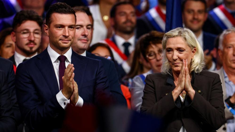 Marine Le Pen on the right, French hard-right leader and member of parliament, who is running in the 2027 French presidential election for the RN, and Jordan Bardella, president of the French far-right Rassemblement National (National Rally - RN) on the left