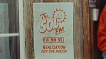 Poster advertising Sol FM 98 92 that also says Realization for the Nation