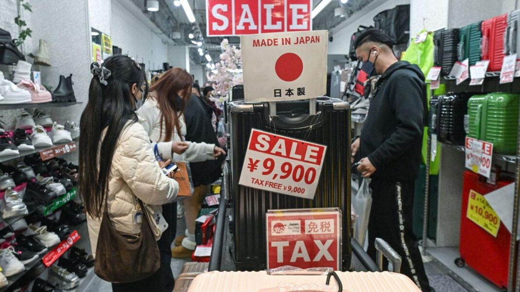 Japan raises interest rate to new 31-year high to curb rising prices The interior of a retail store known for its dense 'jungle-like' displays and competitive pricing on items like luggage and shoes, seen with interior 'sale' signs, in central Osaka, Japan, on 1 April, 2026.