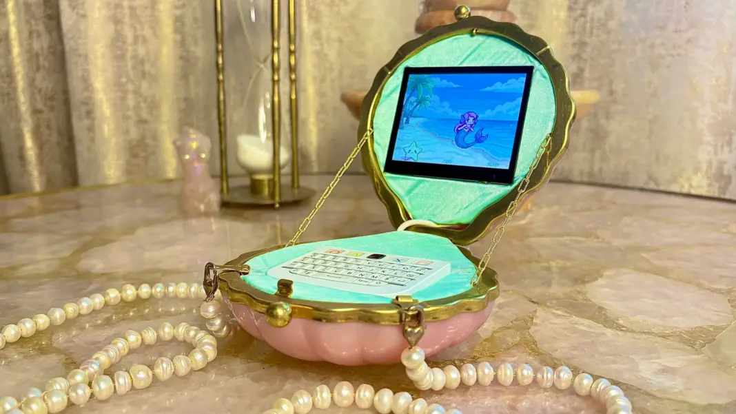 Meta’s Muse Charm looks like a Tamagotchi, but it’s tapping into a much newer trend shell purse with keyboard and screen