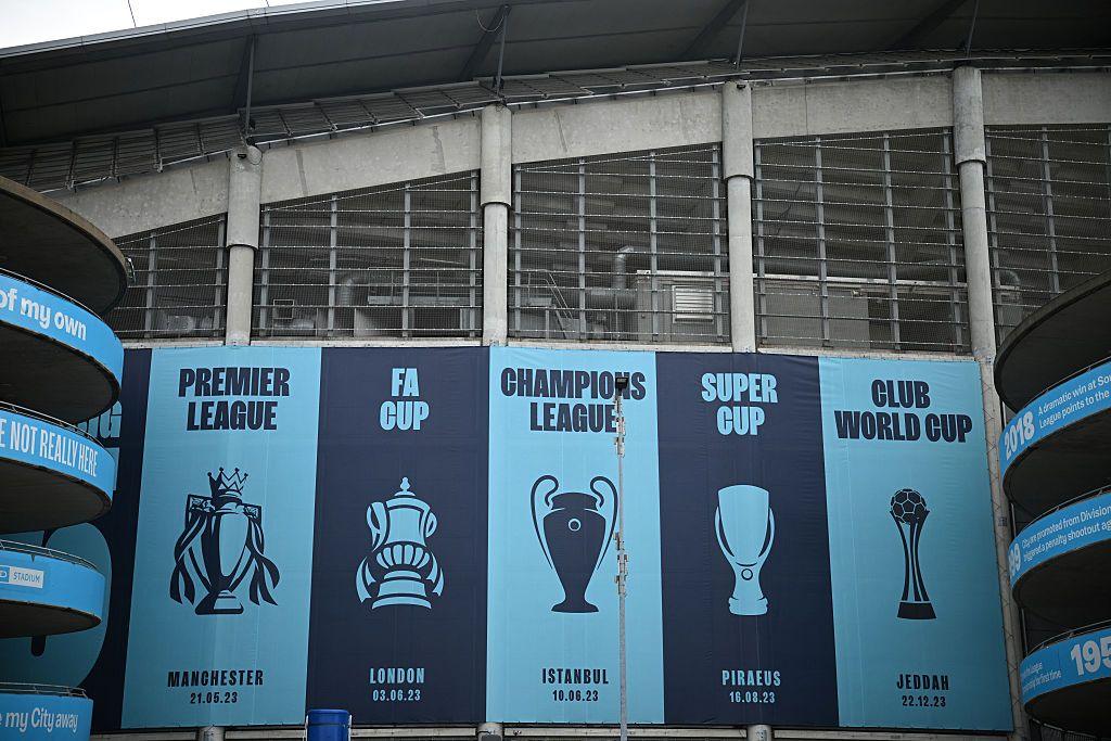 Images of trophies won are pictured outside the Etihad Stadium, the home ground of Manchester City football club